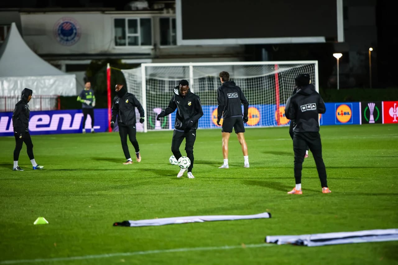 Igrači se zagrijavaju pred utakmicu