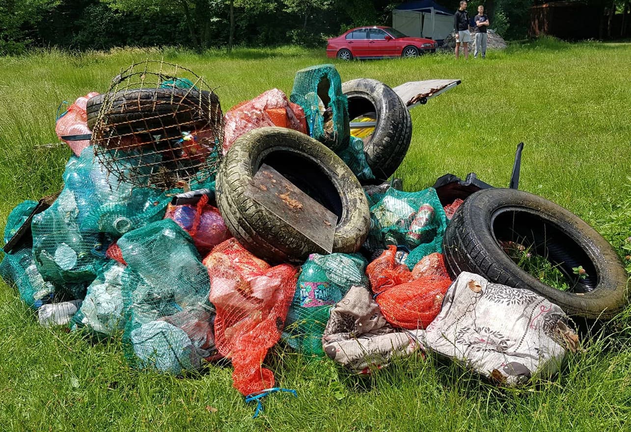 Iz Boračkog jezera izvađeno 300 kilograma stakla, plastike i guma